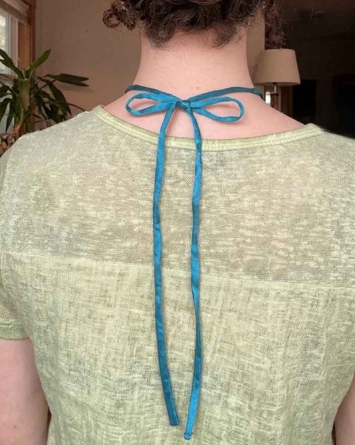 Silk Road Pendant: Elegant Silver Pendant on Silk Cord