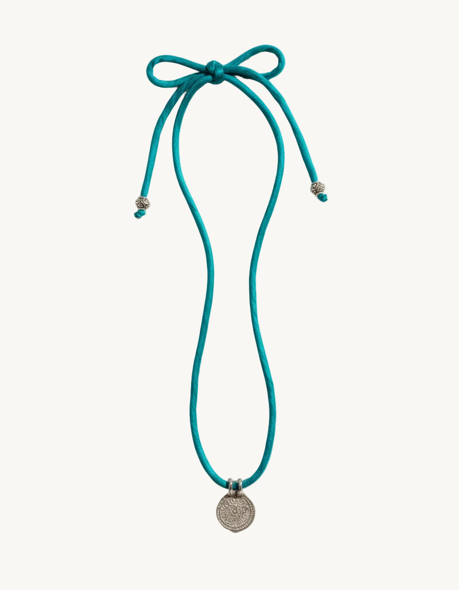 Silk Road Pendant: Elegant Silver Pendant on Silk Cord