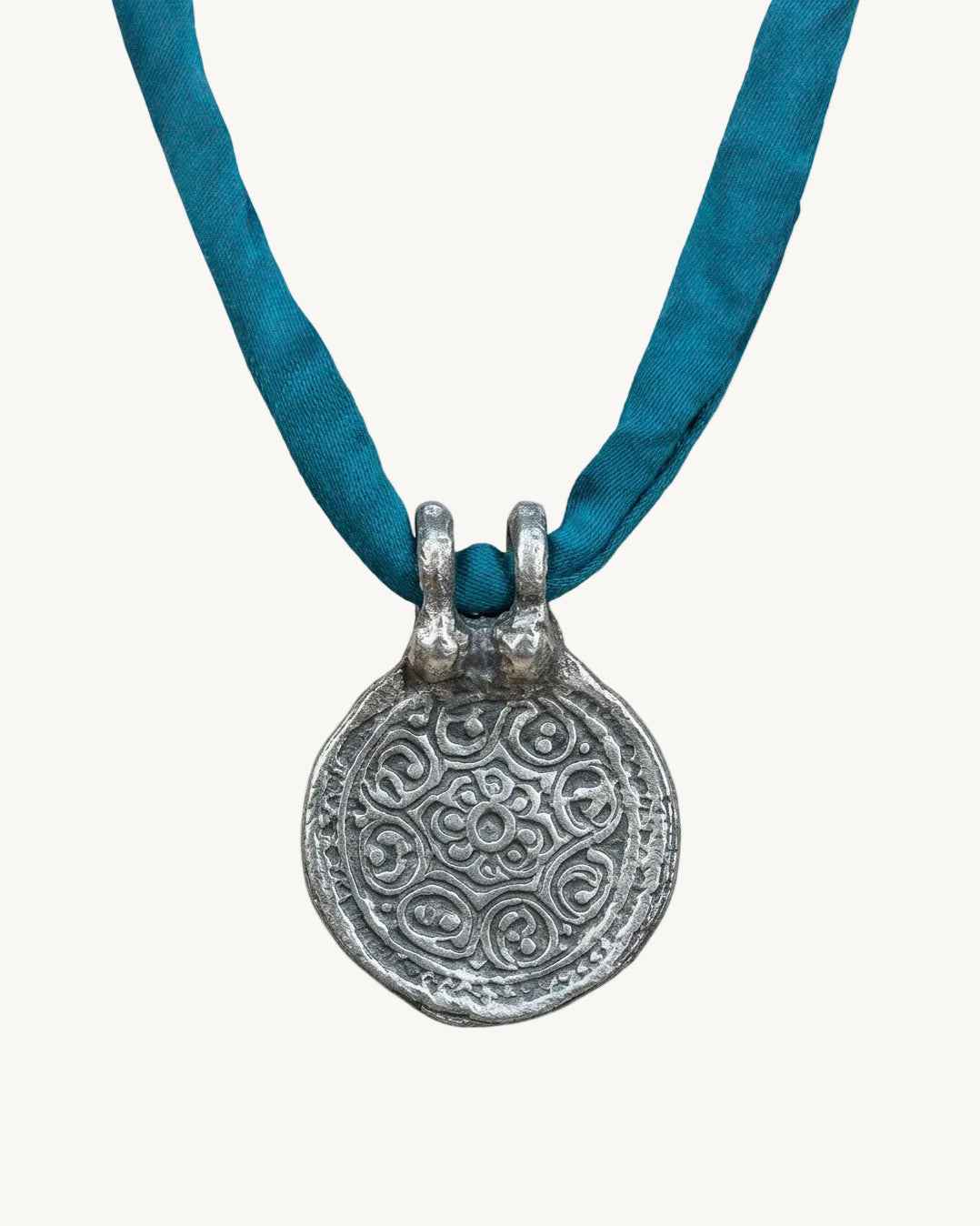 Silk Road Pendant: Elegant Silver Pendant on Silk Cord