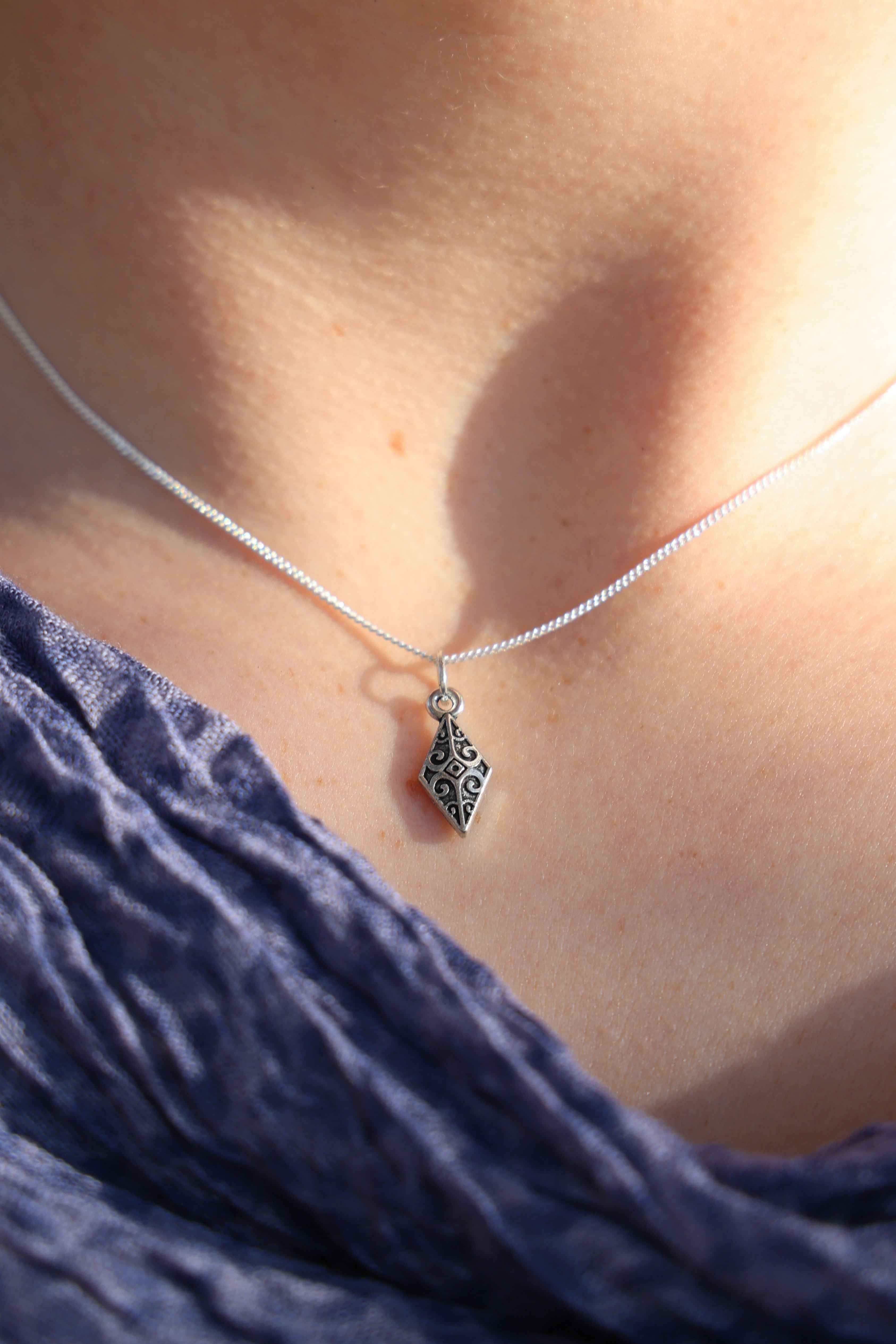 The Arrow Head Silver Pendant: Strength in Simplicity