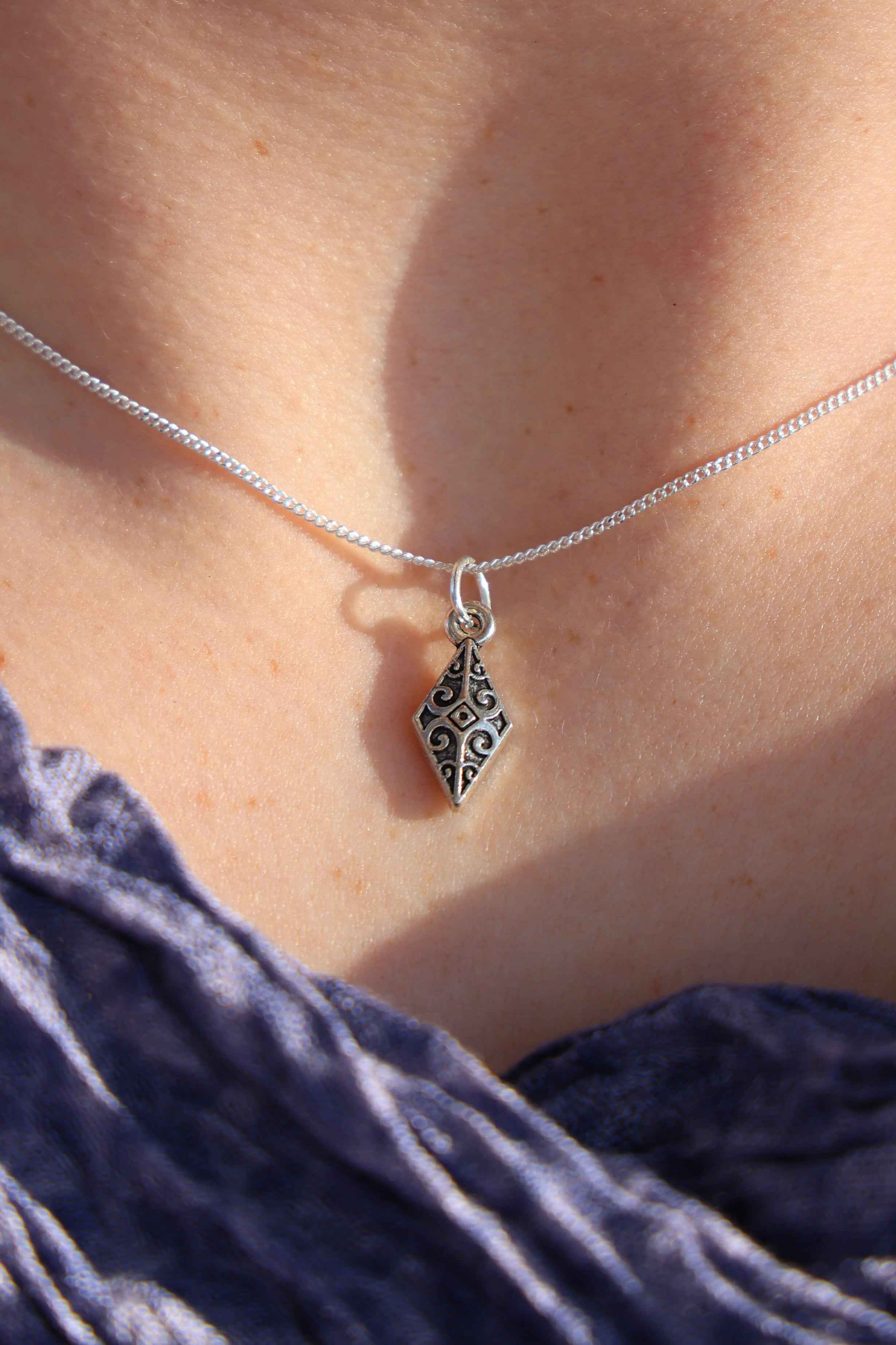 The Arrow Head Silver Pendant: Strength in Simplicity