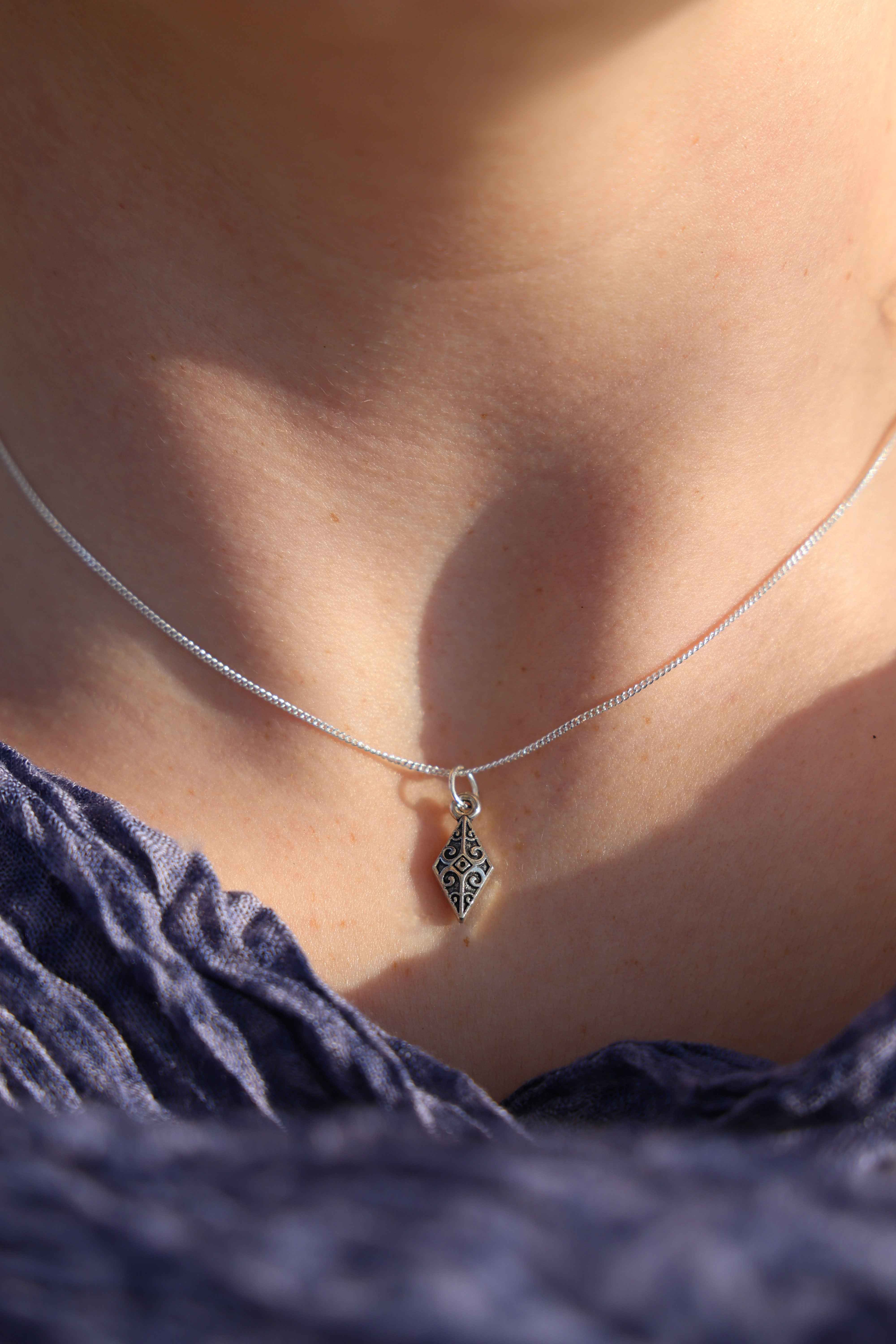 The Arrow Head Silver Pendant: Strength in Simplicity