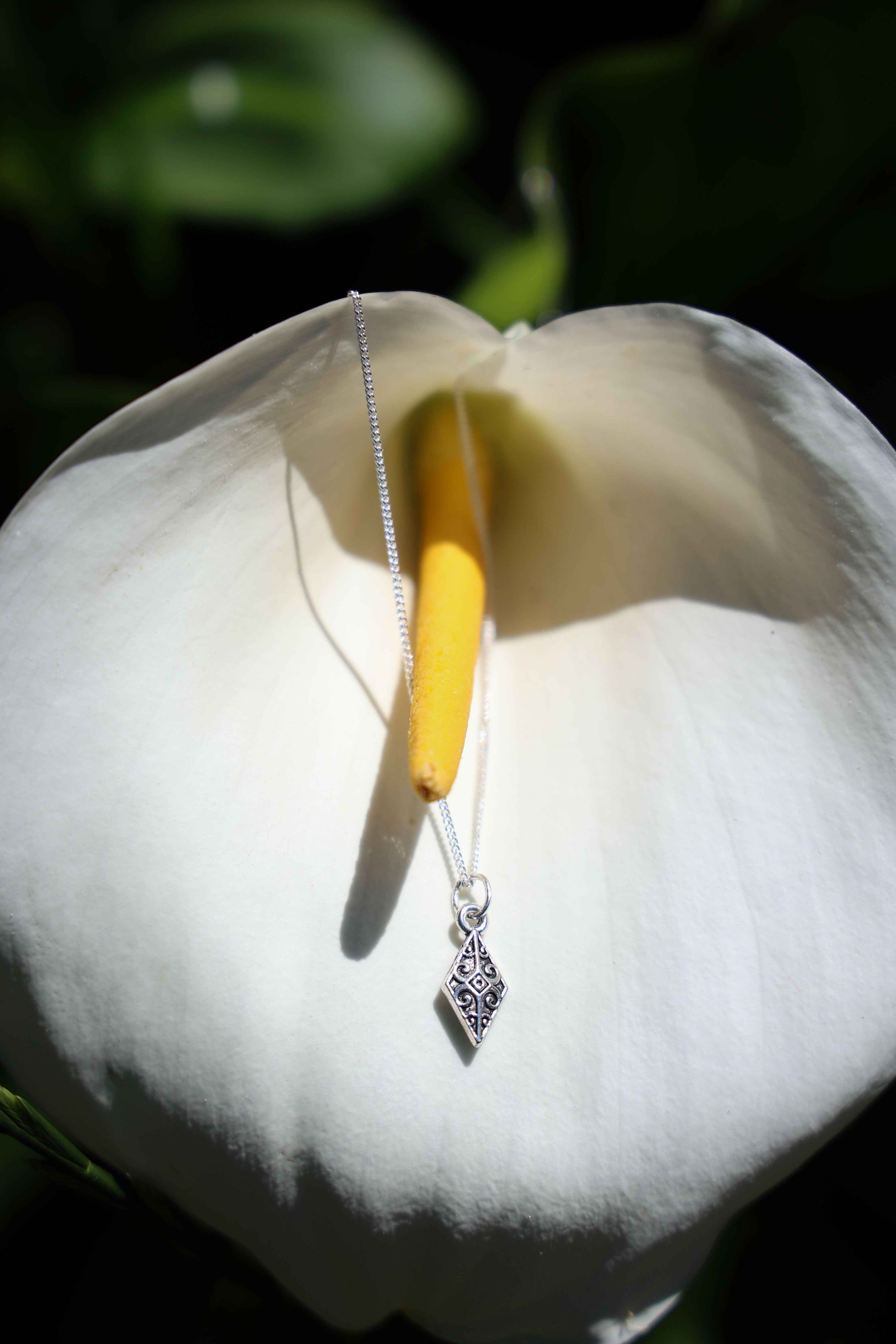 The Arrow Head Silver Pendant: Strength in Simplicity