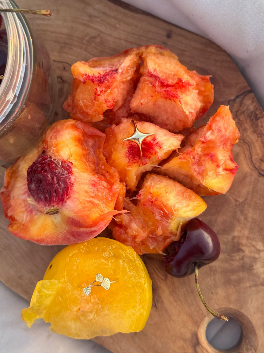 star ring and ginkgo ring placed on fruit