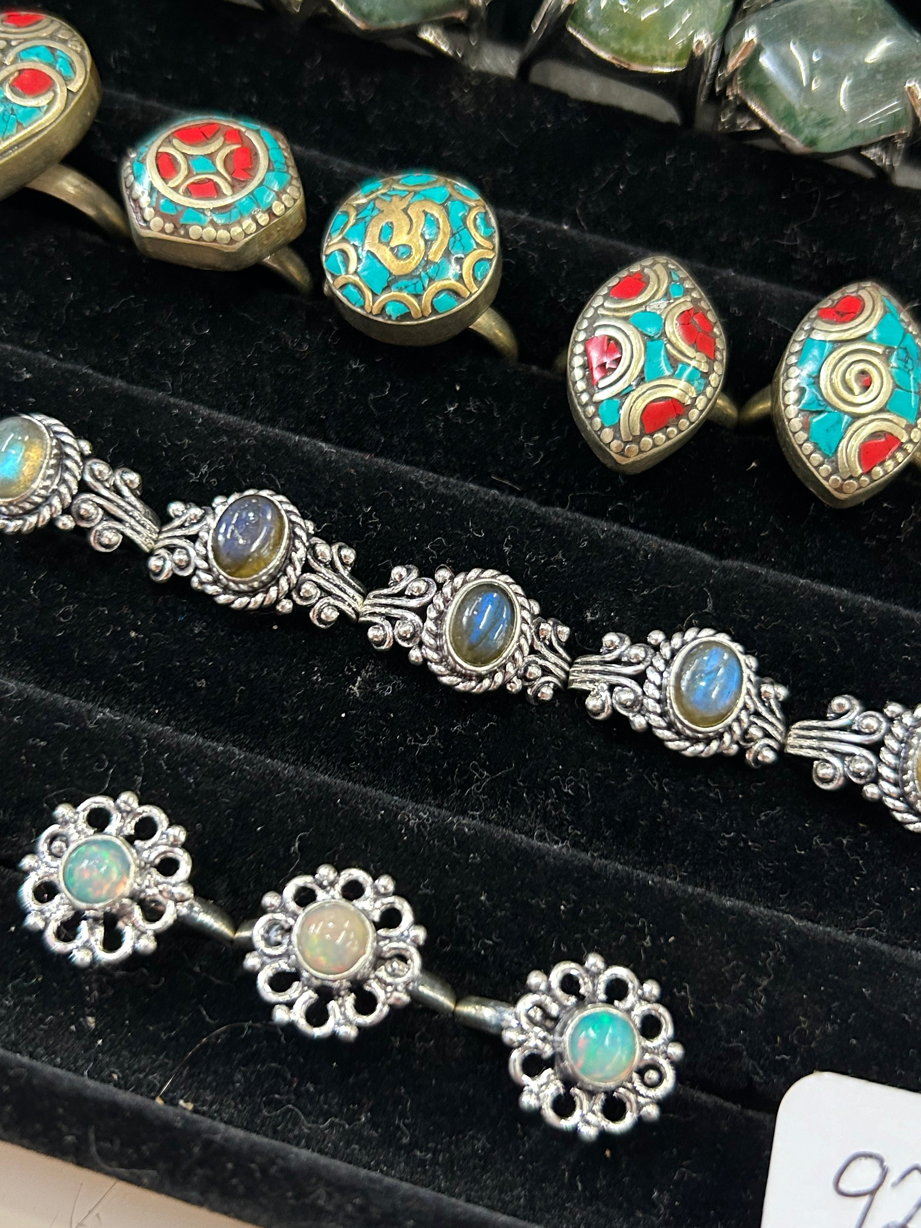 Assortment of 925 Sterling Silver Stacking Rings and Adjustable Minimalist Rings displayed together.