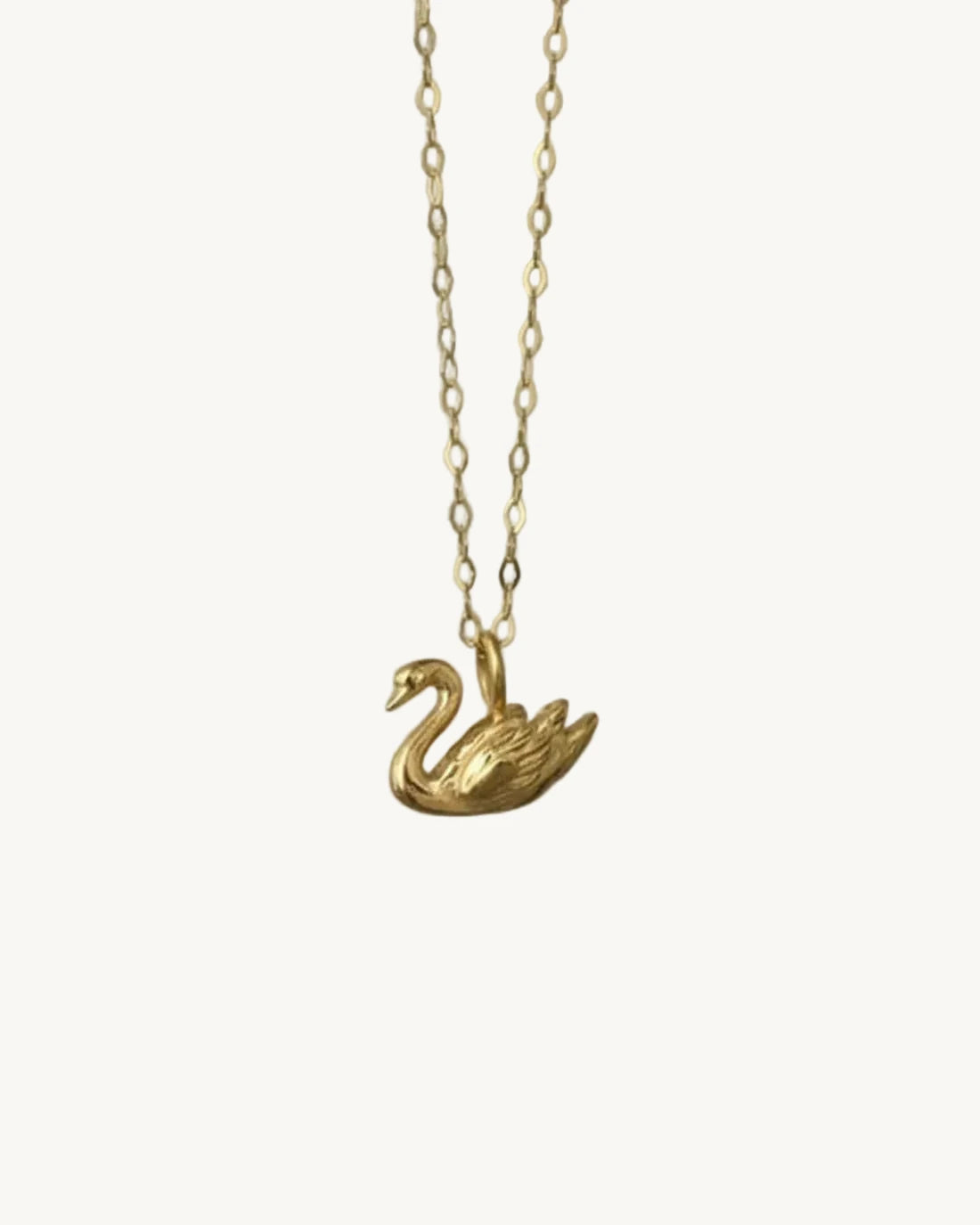 Gold swan pendant necklace