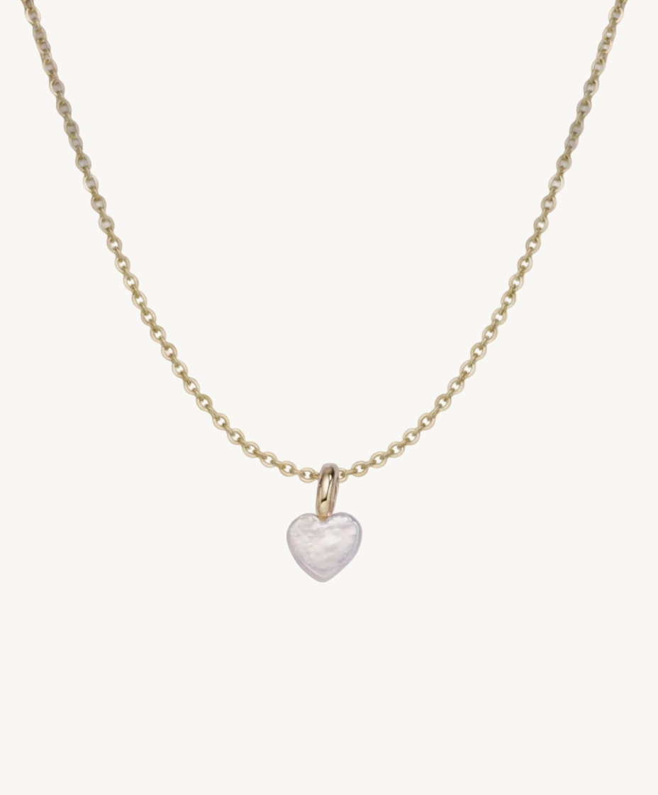 Necklace with a heart-shaped pearl pendant on a gold chain