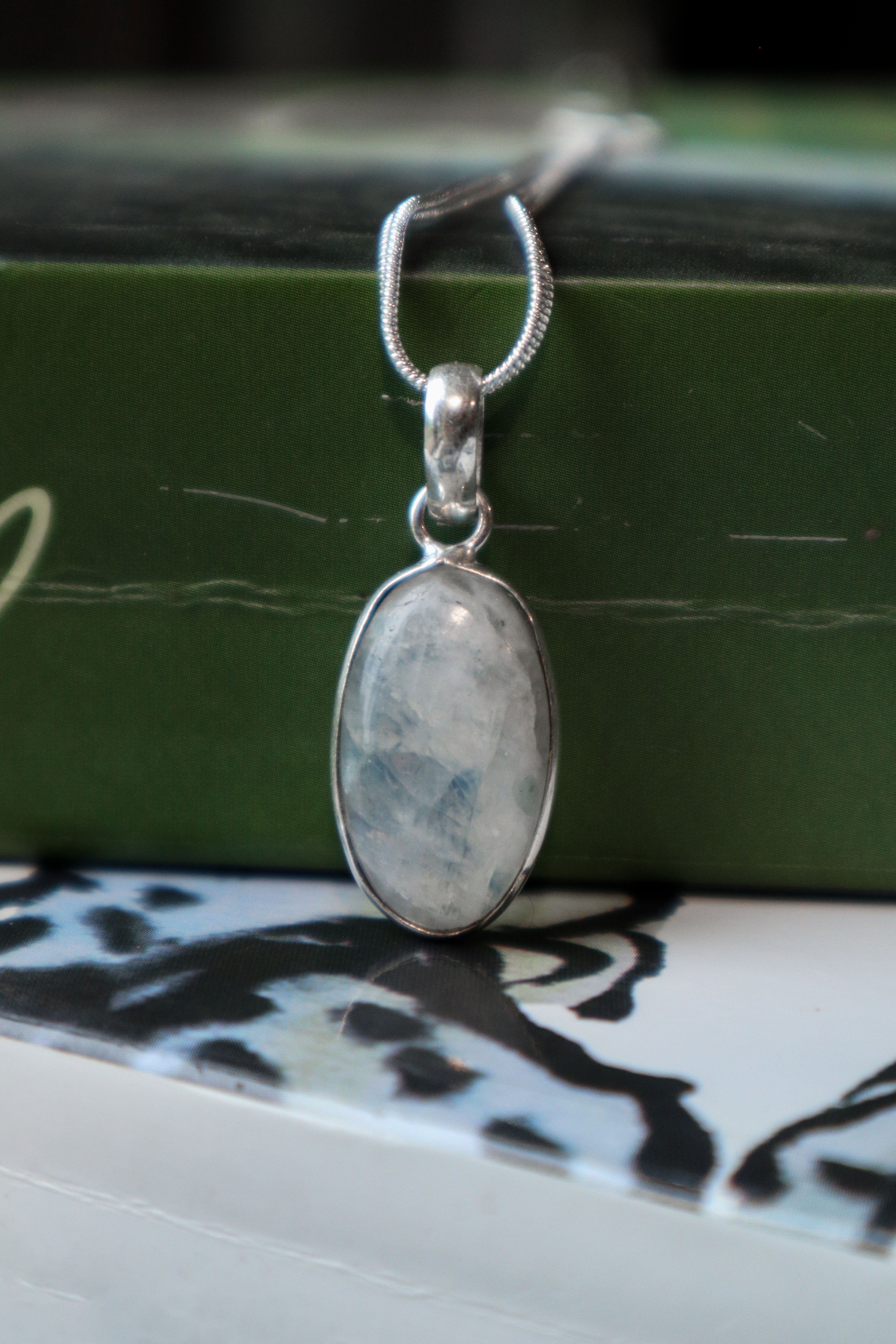 Close-up of the "Eve" Moonstone Pendant Necklace, showing the stone's glow and the fine 925 Sterling Silver Moonstone Pendant setting.