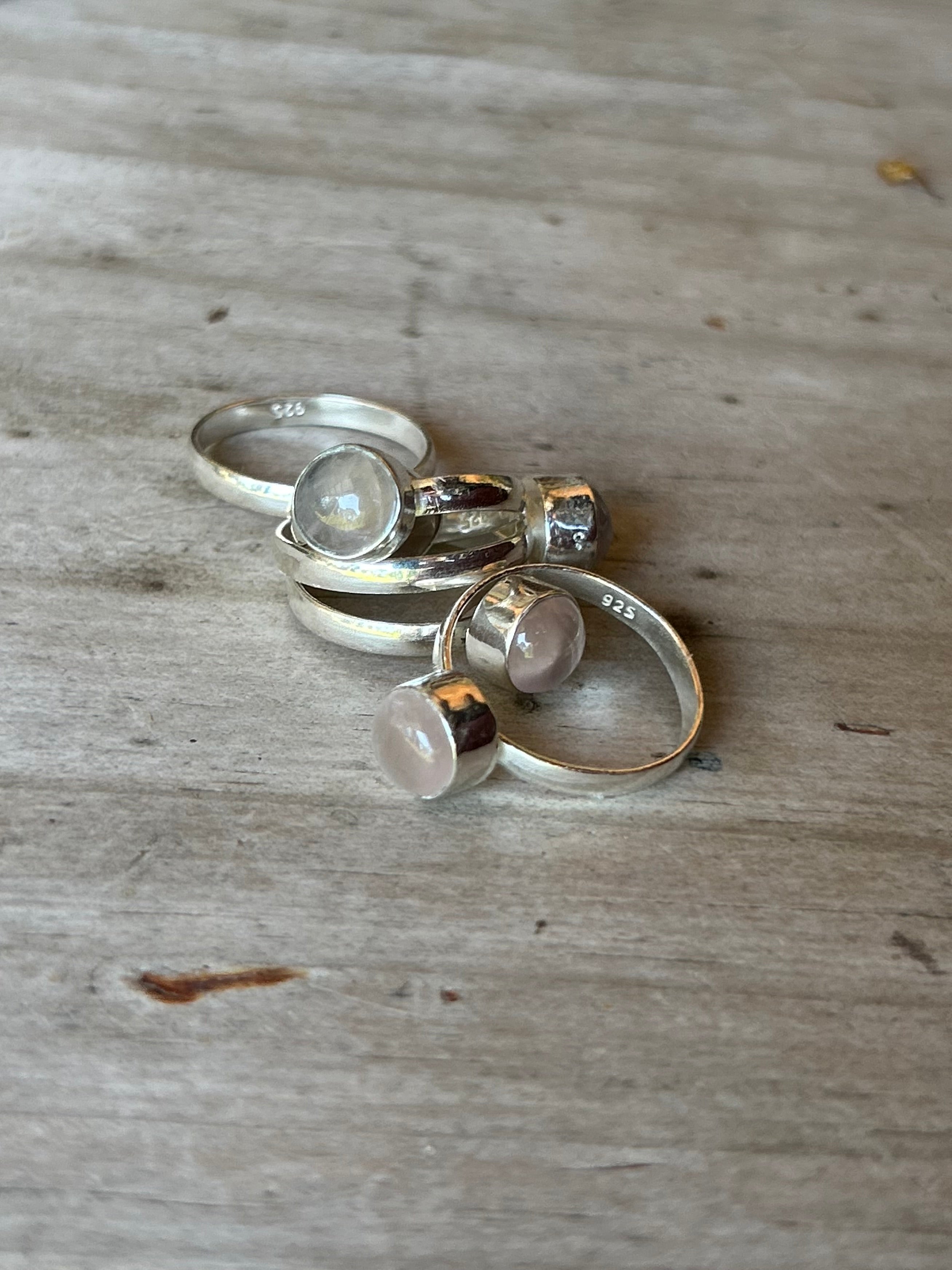 Close-up view of the Circular Gemstone Ring showing the dusty Purple Gemstone Sterling Silver Ring centrepiece and the Recycled 925 Sterling Silver Ring band.