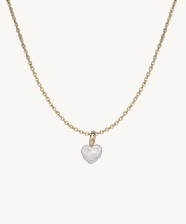 Necklace with a heart-shaped pearl pendant on a gold chain 
