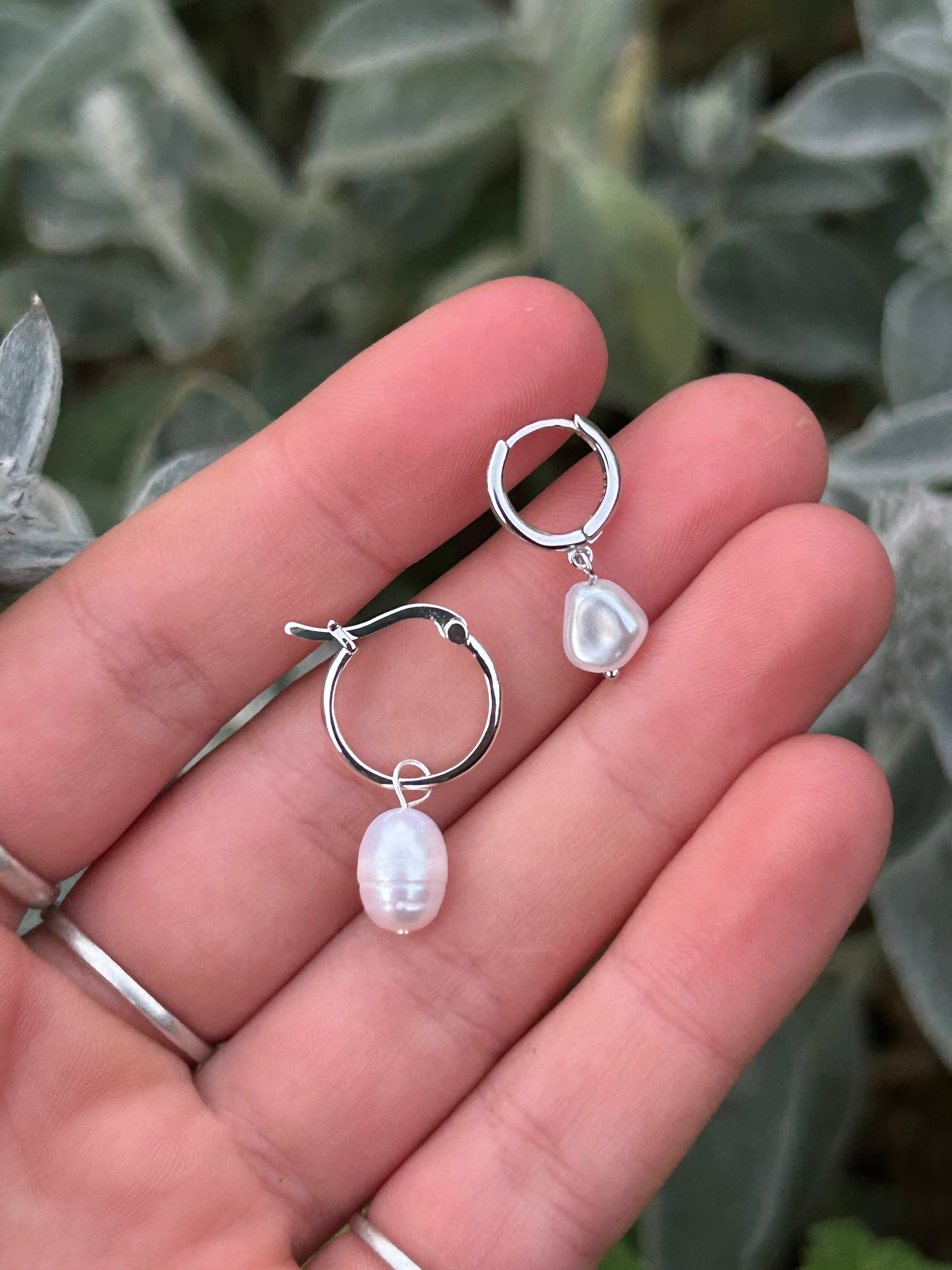 size comparison of small and medium silver hoops 